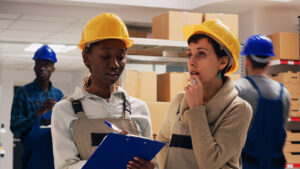 Two women discuss workplace safety