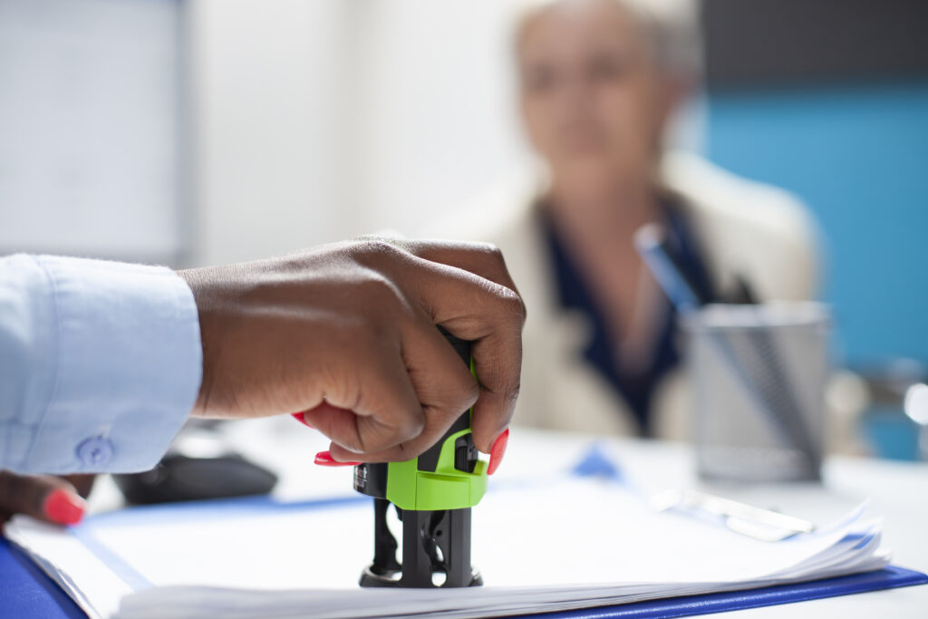 A QCTO worker certifying an occupational health and safety certificate